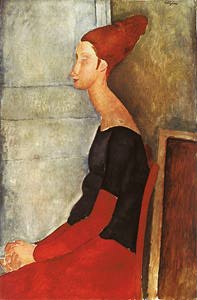 Jeanne Hébuterne seduta, in profilo, con vestito rosso